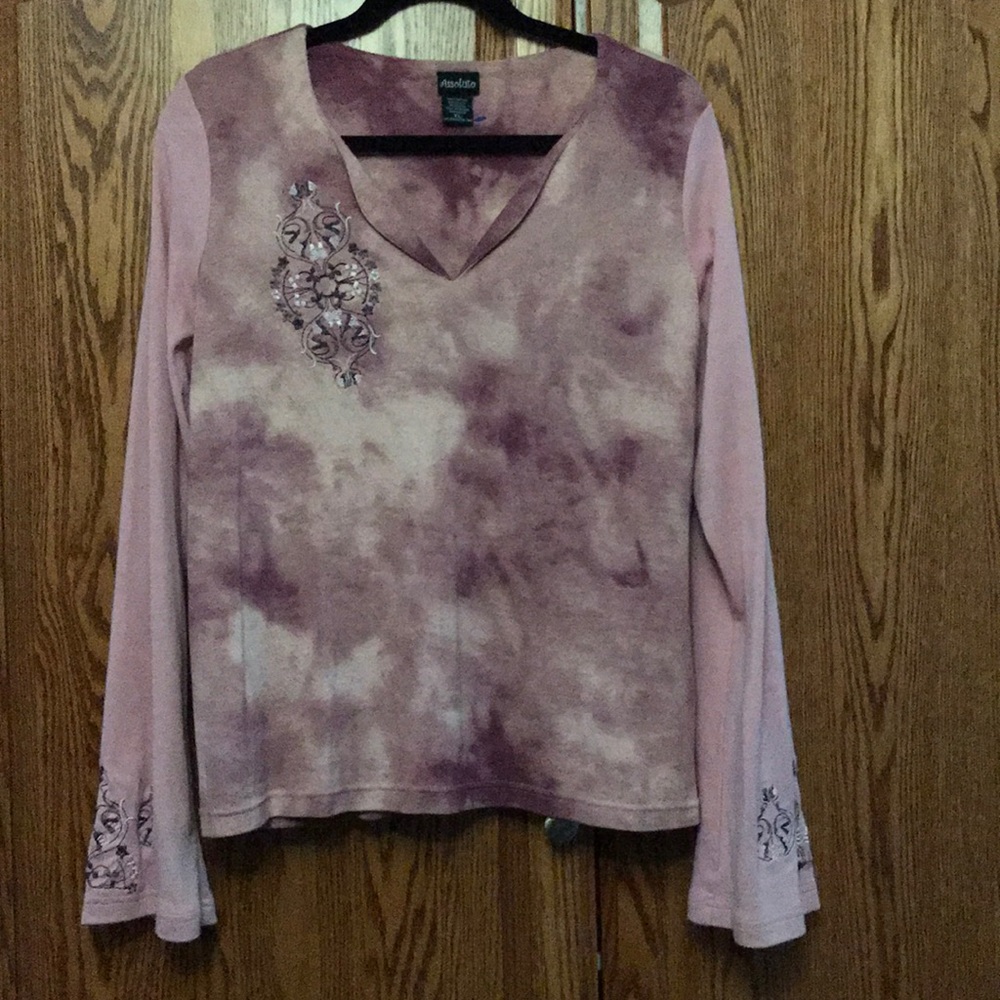 Embroidered multi colored pink blouse.